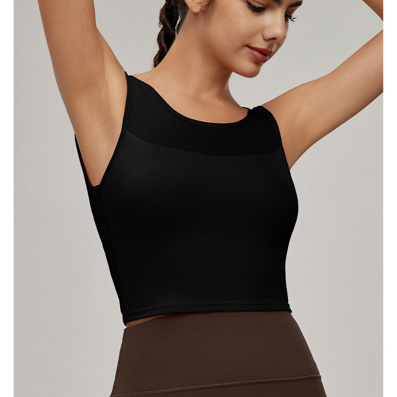 Fashionable black sleeveless crop top with sheer mesh panel, perfect for workout and ملابس