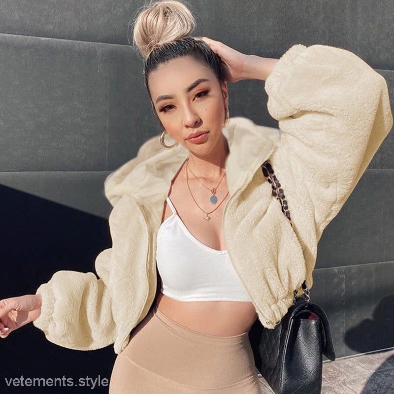 Woman wearing a Plush Long Hooded jacket, perfect for autumn outings