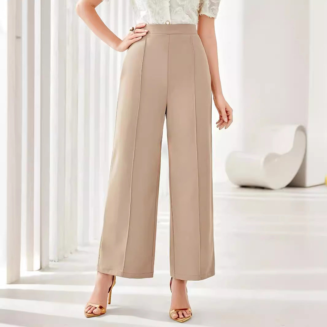 High-waisted beige wide leg trousers with seam details for elegant casual fashion