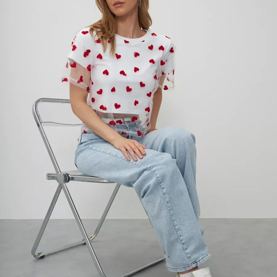 Elegant Faux Two Piece Cotton Short Top styled with heart-patterned t-shirt and jeans