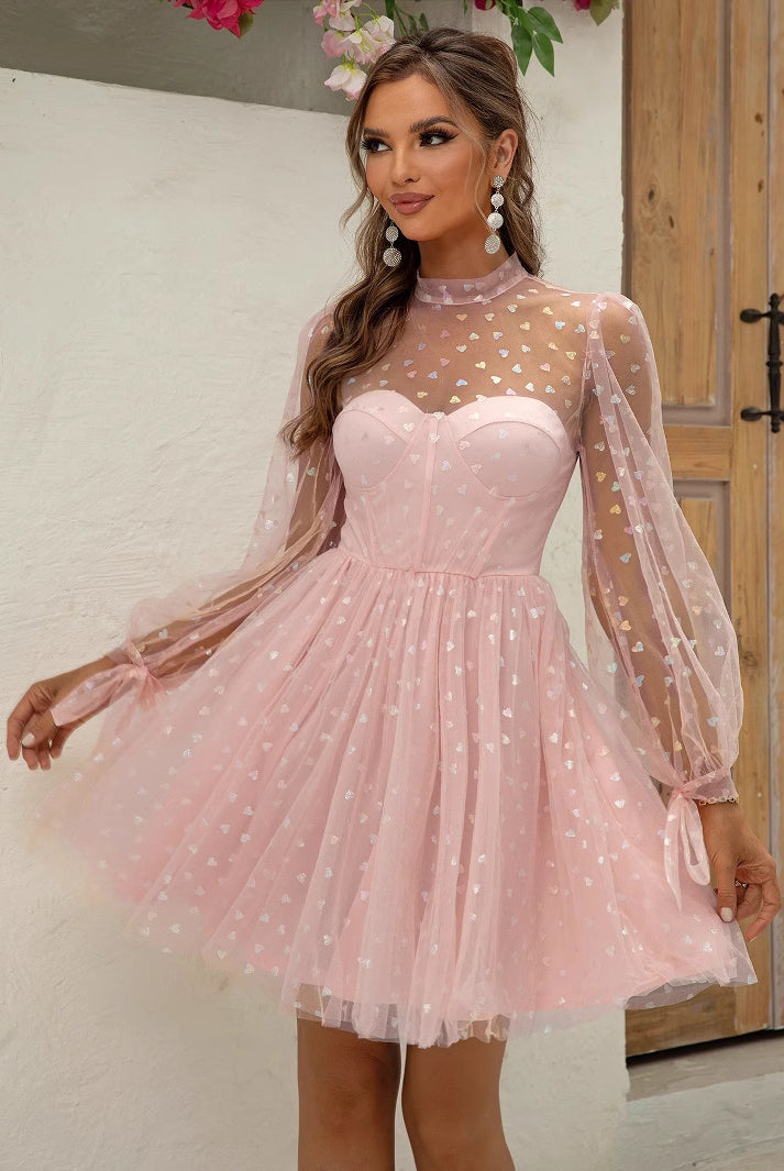 Pink tulle cocktail dress with sheer polka dot sleeves, part of Elegant Barbie Dress fashion