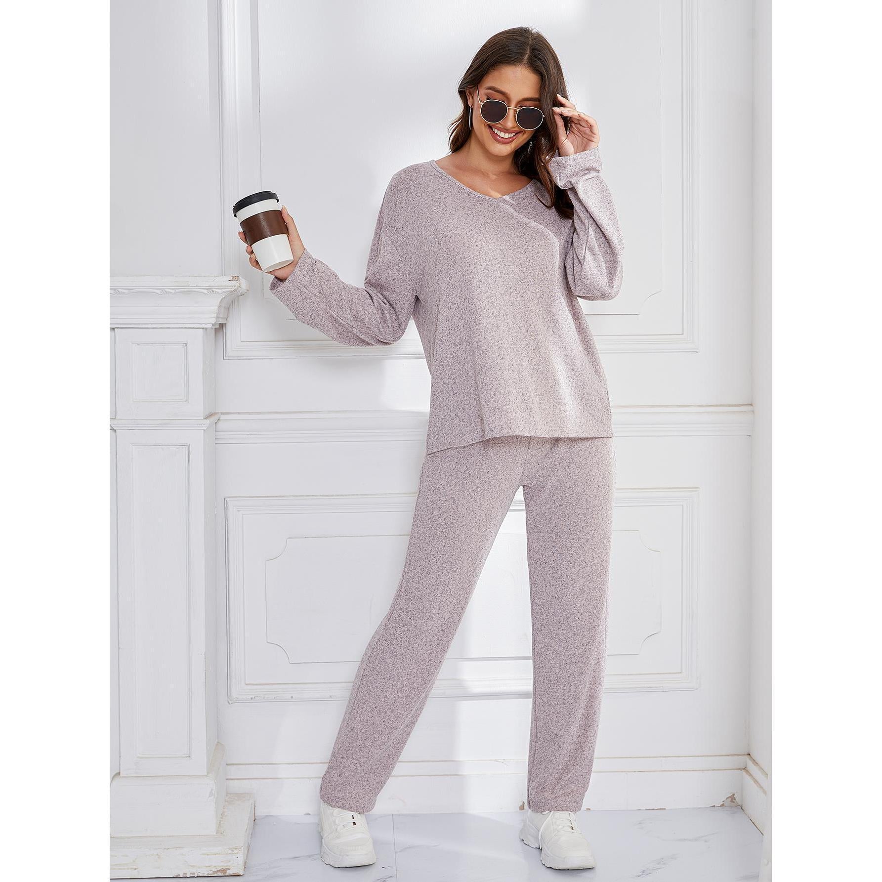 Woman in lavender winter outerwear loose sports casual loungewear set for home wear