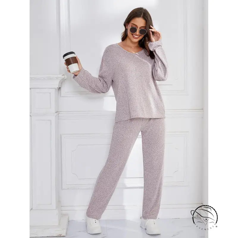 Woman in lavender loose sports casual winter outerwear loungewear set
