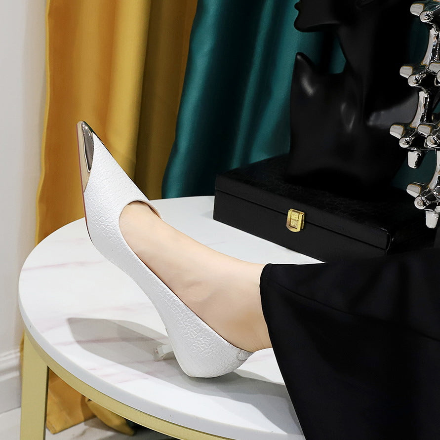 White leather pump with metallic toe from Langry, perfect for stylish fashion ensembles