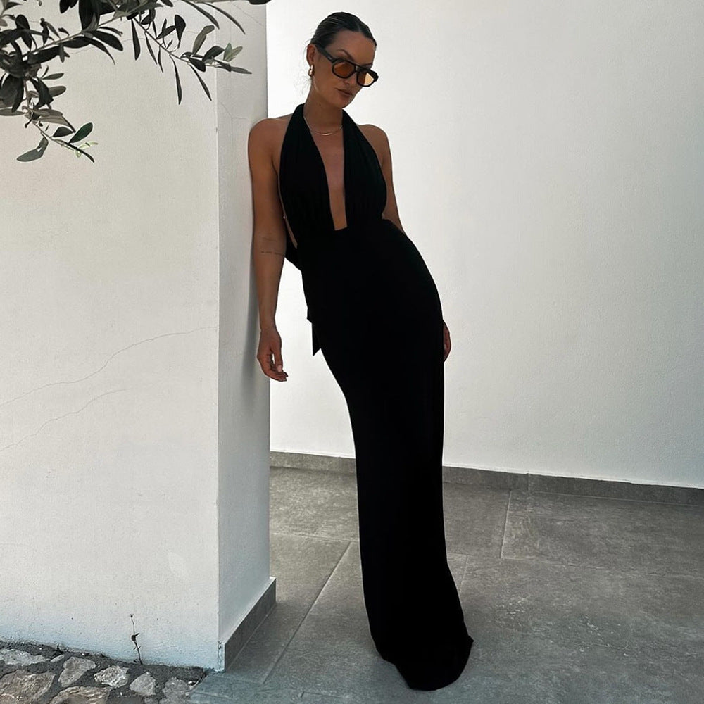 Black halter maxi dress showcasing elegant style in the Slim Halter Maxi Dress collection