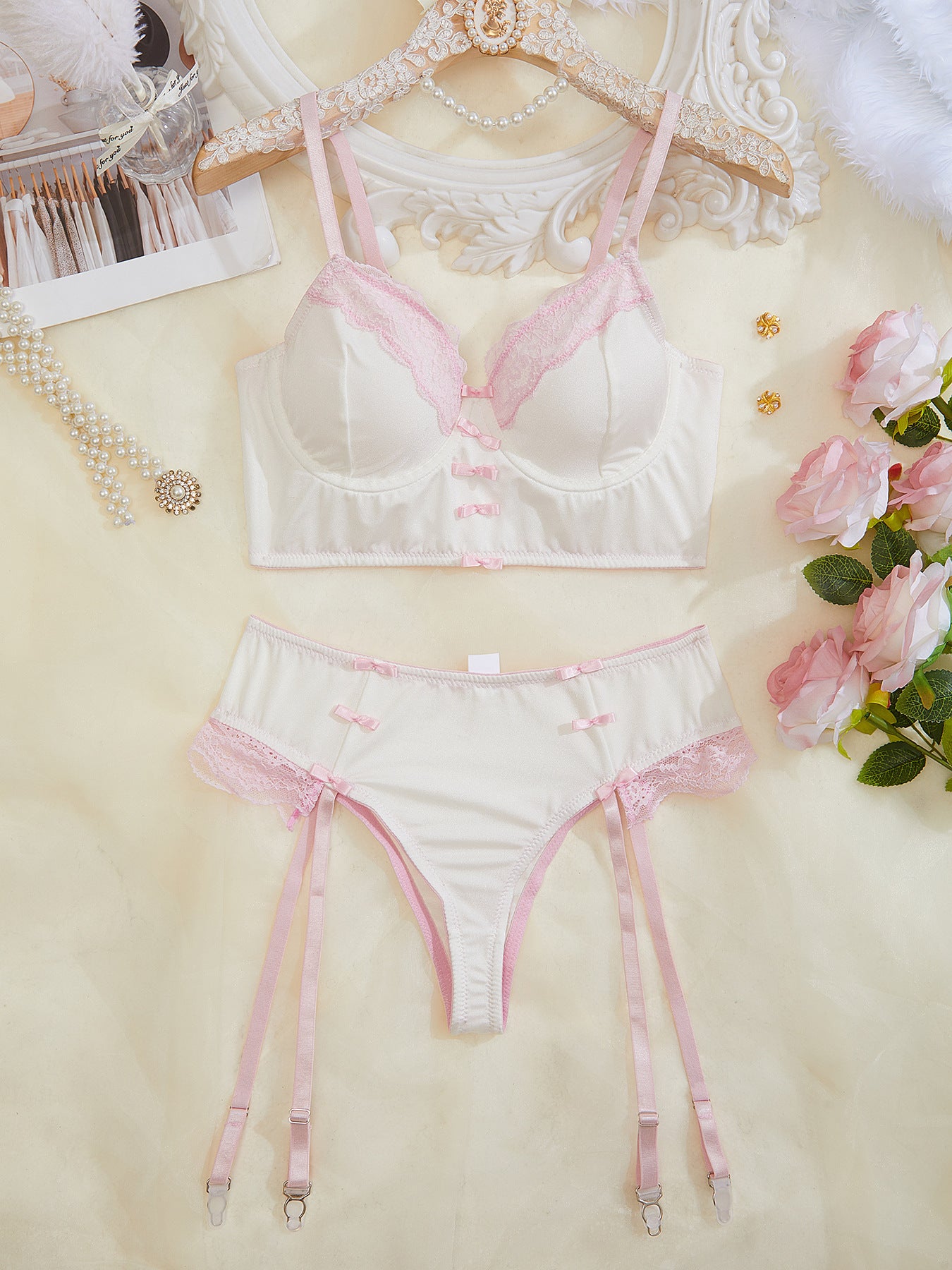 White lingerie set with pink lace trim from Underwear Lace See Through Temptation Bra T Back Two Piece Set for elegant fashion and ملابس