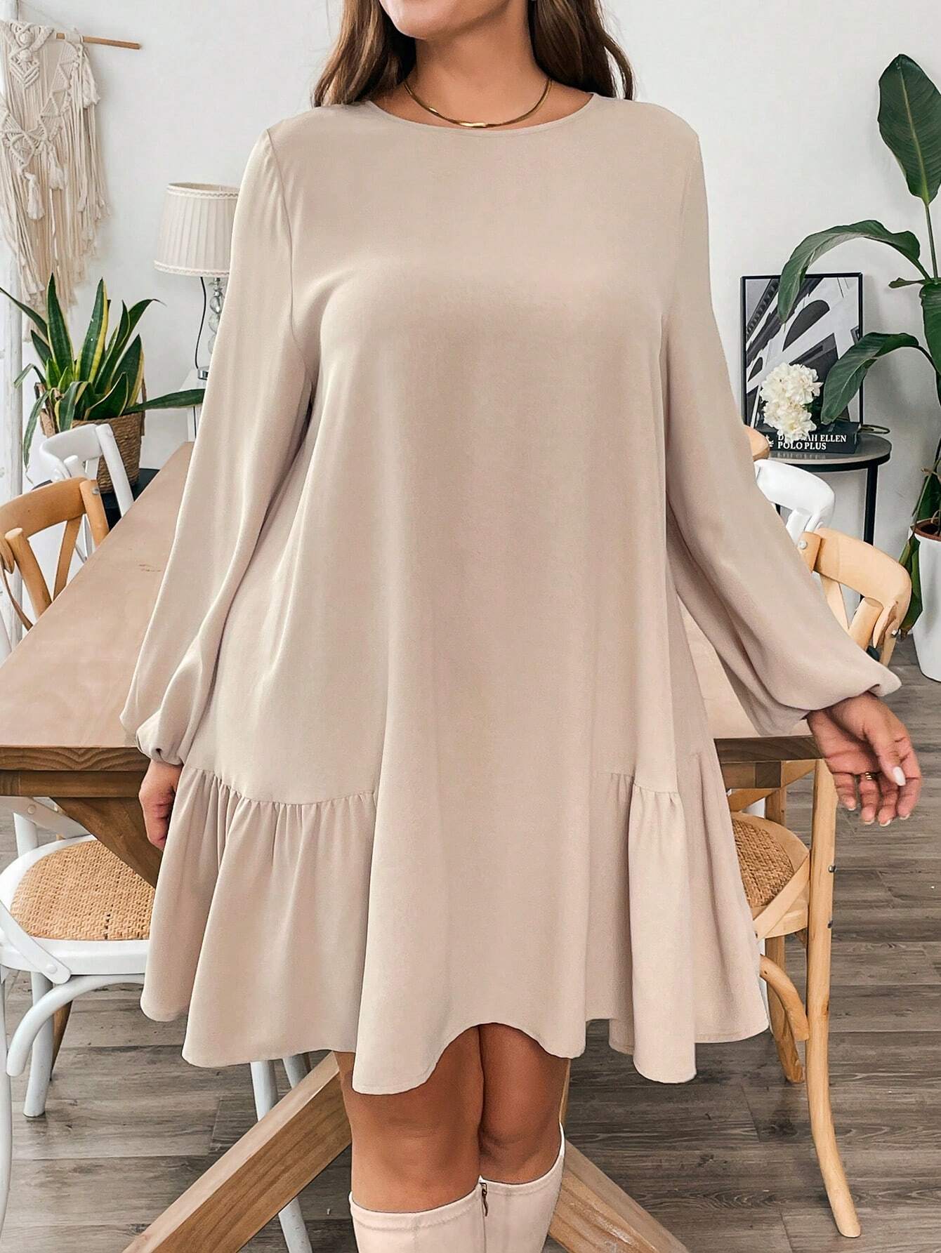 Light brown long-sleeved midi dress with ruffled hem, perfect for winter fashion