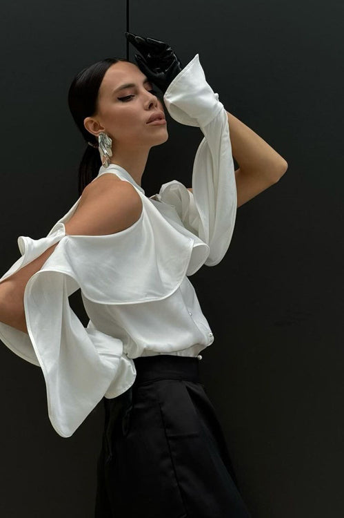 Dramatic white ruffled blouse with black skirt featuring Elegant French Design halter top fashion