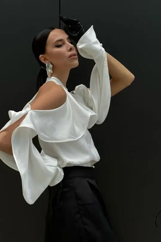 Elegant French design halter top: white ruffled blouse with black skirt