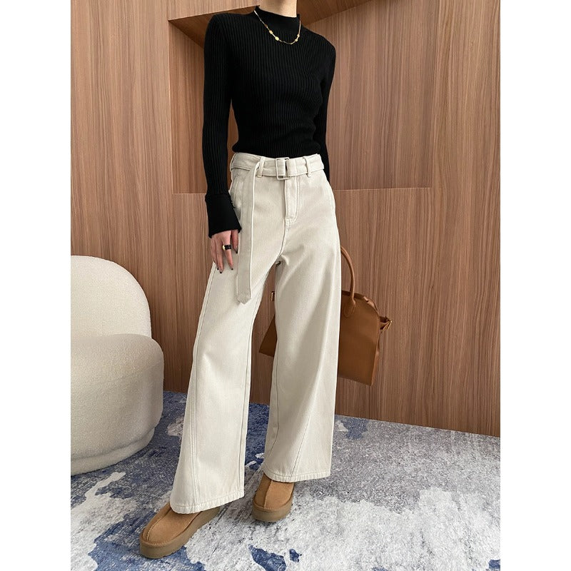 Cream-colored wide-leg pants and black ribbed sweater for langry fashion style