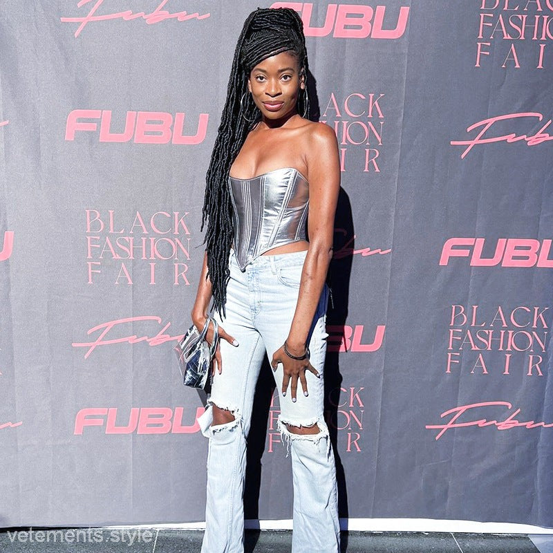 Silver strapless corset top showcasing modern elegant fabric waist design on Model Roz Corset