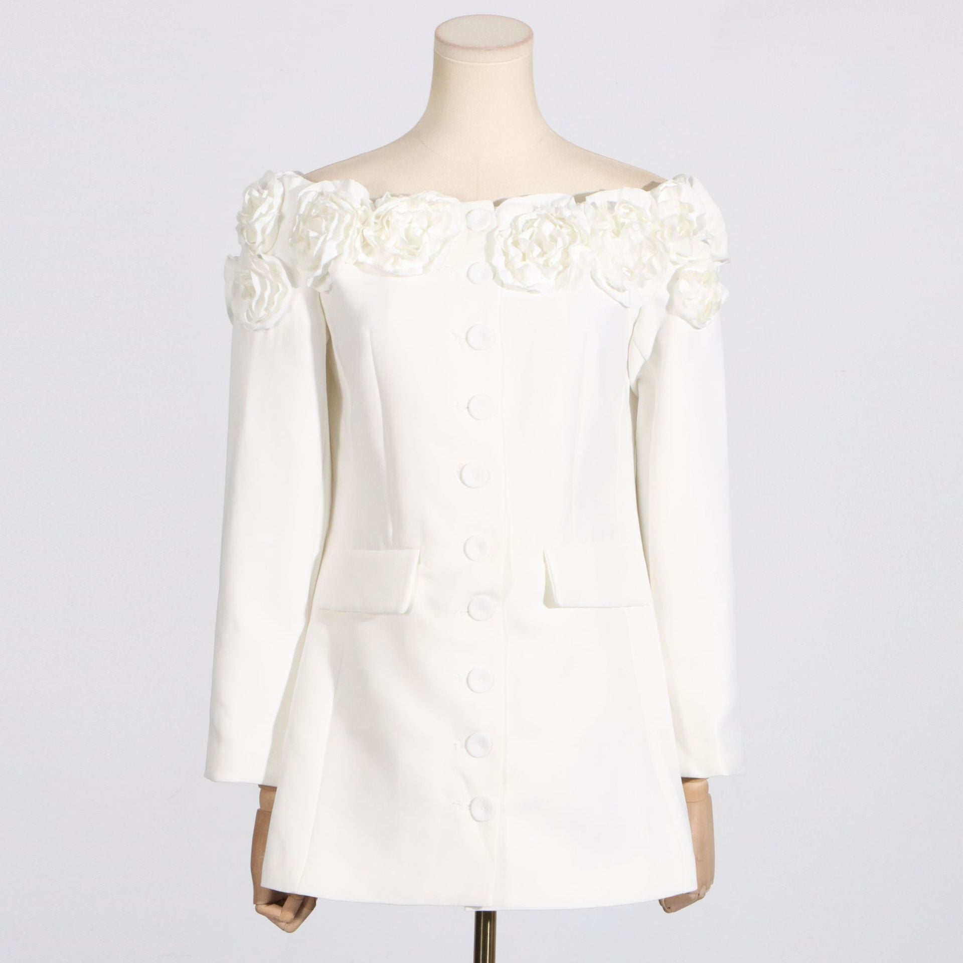 White off-the-shoulder dress with floral embellishments perfect for summer fashion ملابس