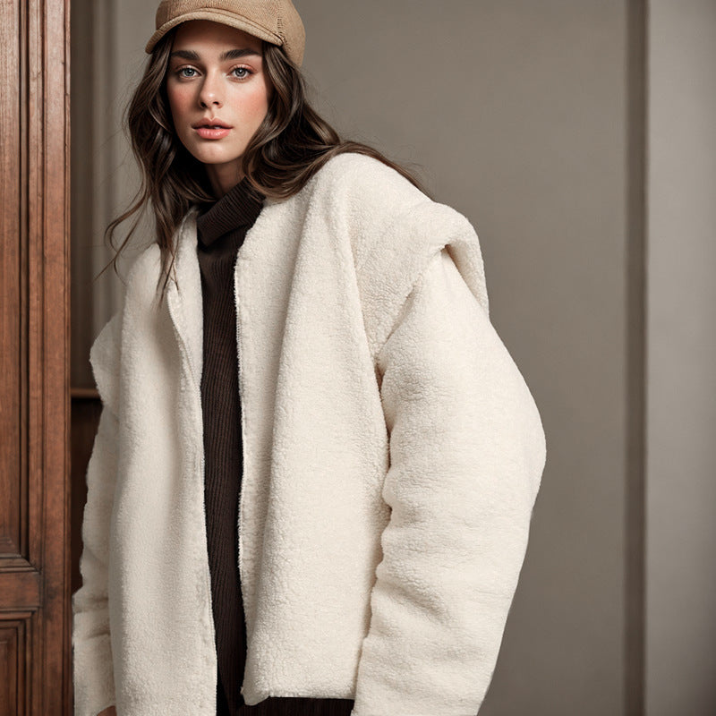 Woman in a beige cap and fluffy white jacket wearing Langry fashion Berber fleece coat