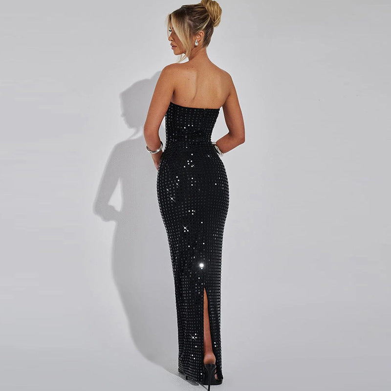Strapless black sequined evening gown with back slit, perfect for elegant fashion occasions