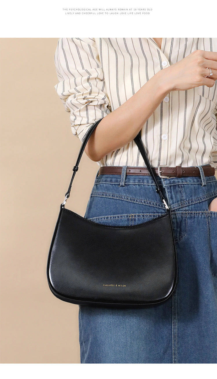 Black leather shoulder bag from Special Interest Design Bag, stylish fashion accessory