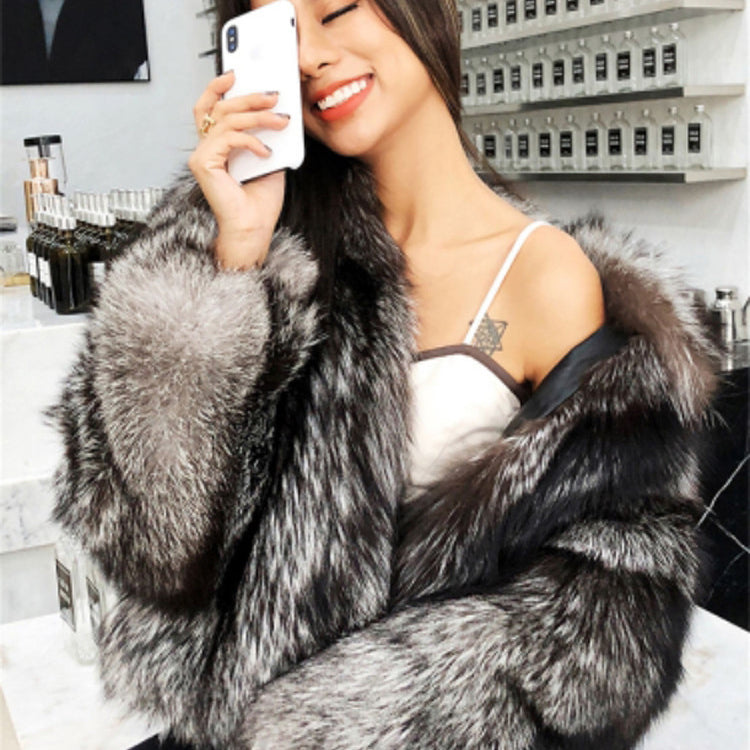 Luxurious black and silver faux fur coat showcasing plush texture for chic fashion