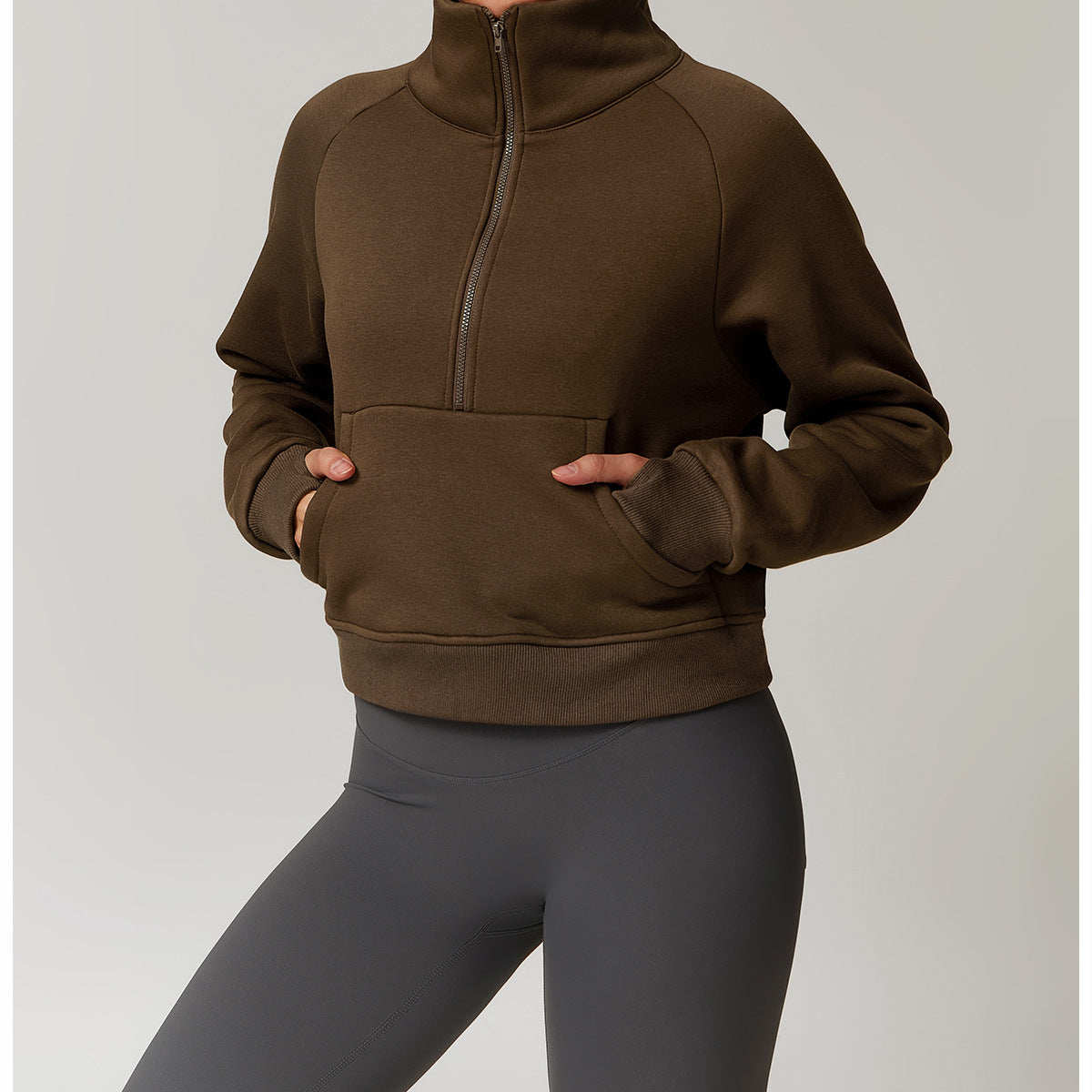 Brown half-zip pullover sweatshirt with kangaroo pocket for winter fashion ملابس by Langry