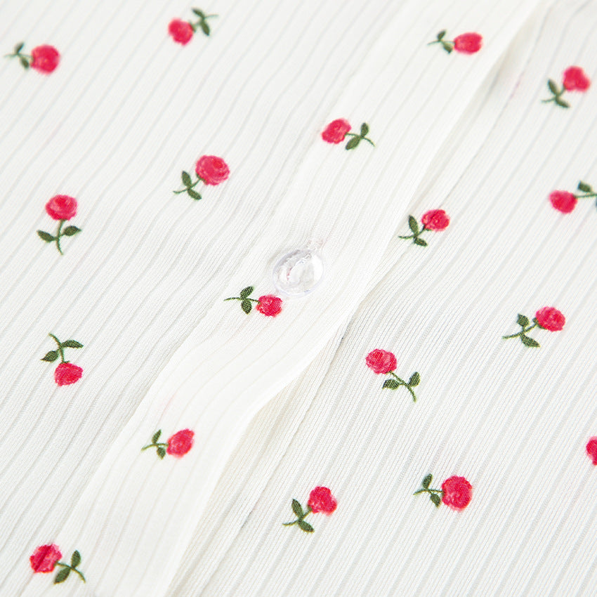 White ribbed fabric with embroidered red roses and button closure for fashionable ملابس and casual homewear