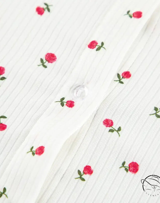 White ribbed langry cardigan with red rose embroidery and button closure