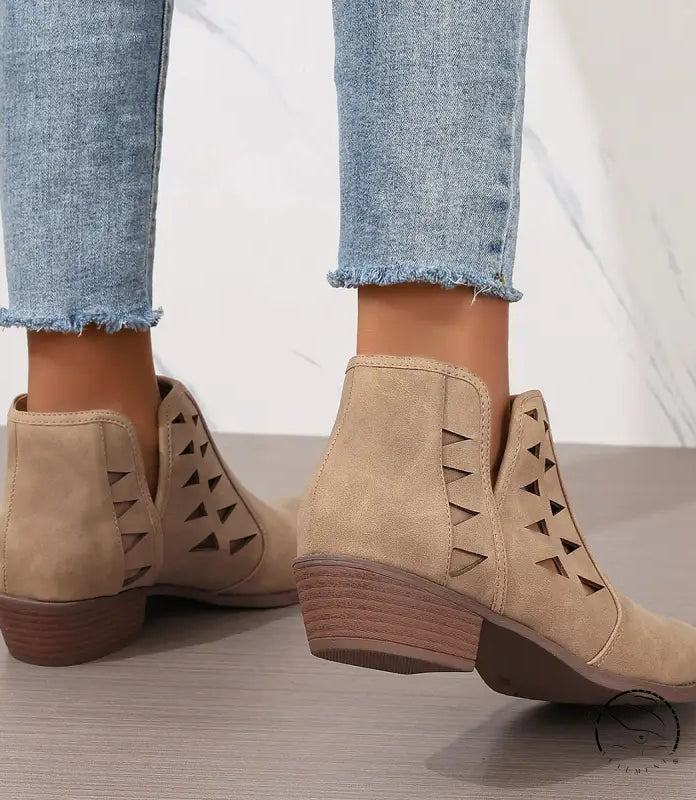 Beige suede daily ankle boots with triangular cutouts and wooden heels