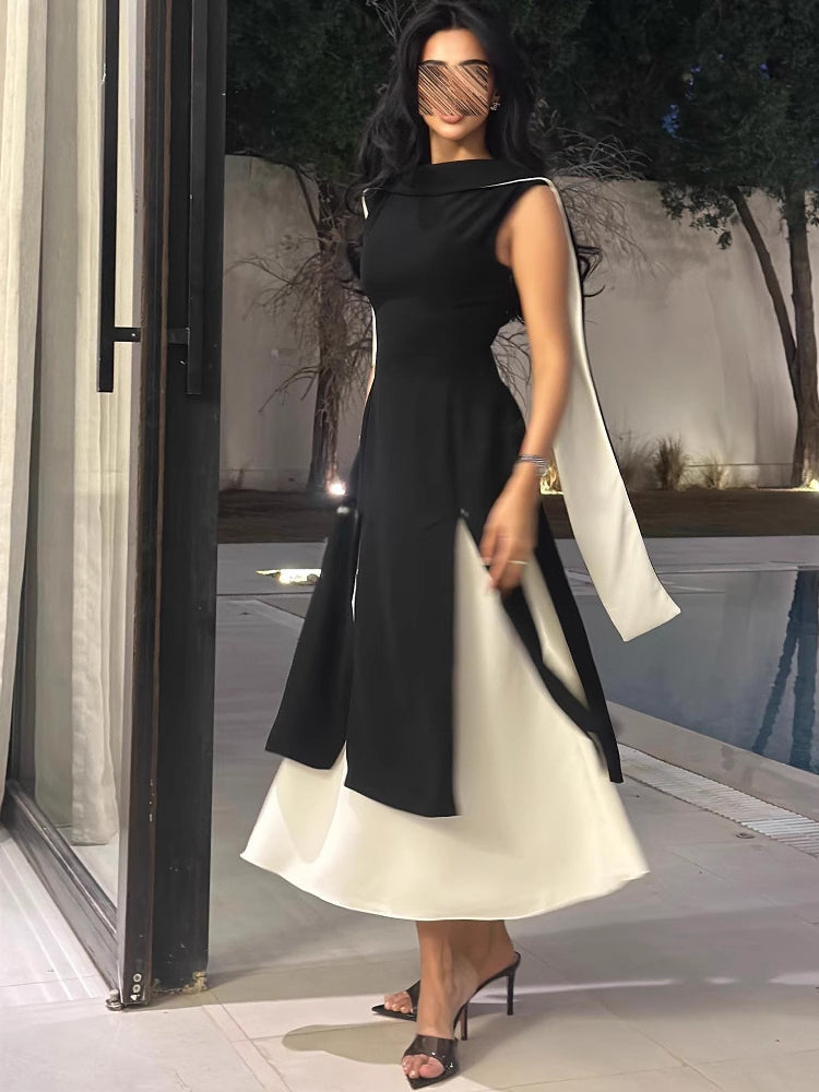 Langry fashion ملابس: black and white sleeveless dress with asymmetrical hem