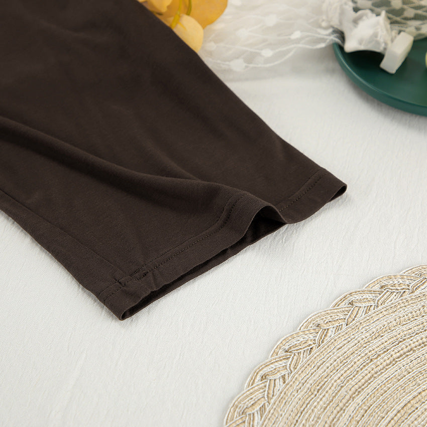 Dark brown full-length plain leggings with finished hem, perfect for casual homewear fashion
