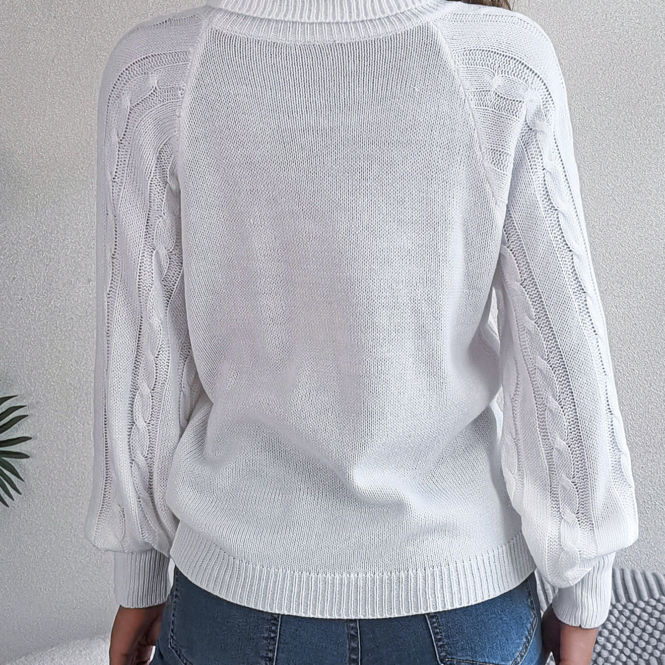 White Langry cable knit sweater with mock neck and long sleeves