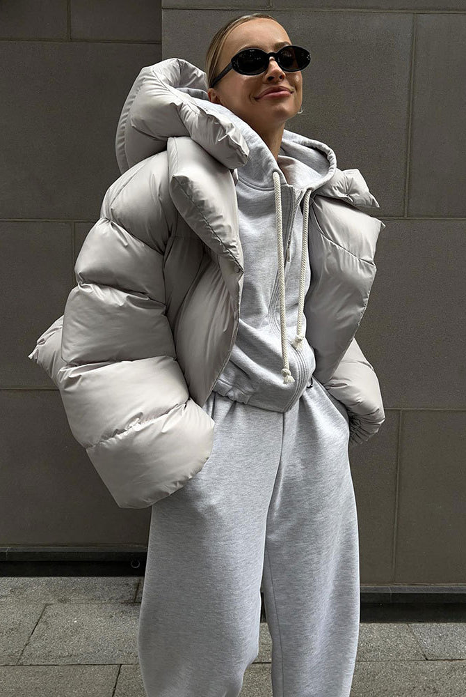 Oversized gray puffer jacket and sweat suit from Langry for trendy winter fashion ملابس