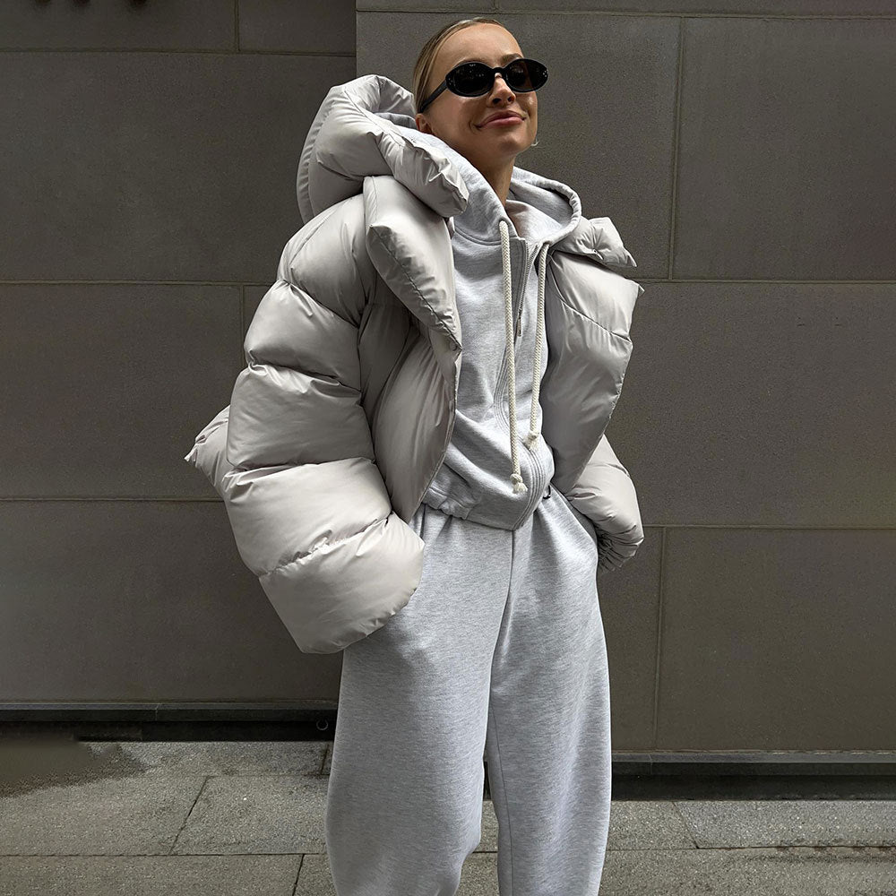 Oversized gray puffer jacket and sweat suit from Langry for trendy winter fashion ملابس