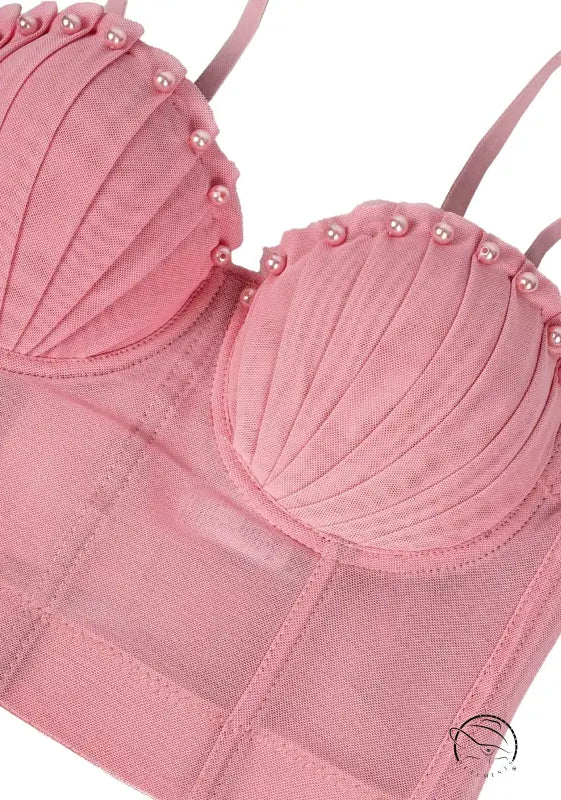 Pink seashell bra with pearl accents in Langry fashion corset