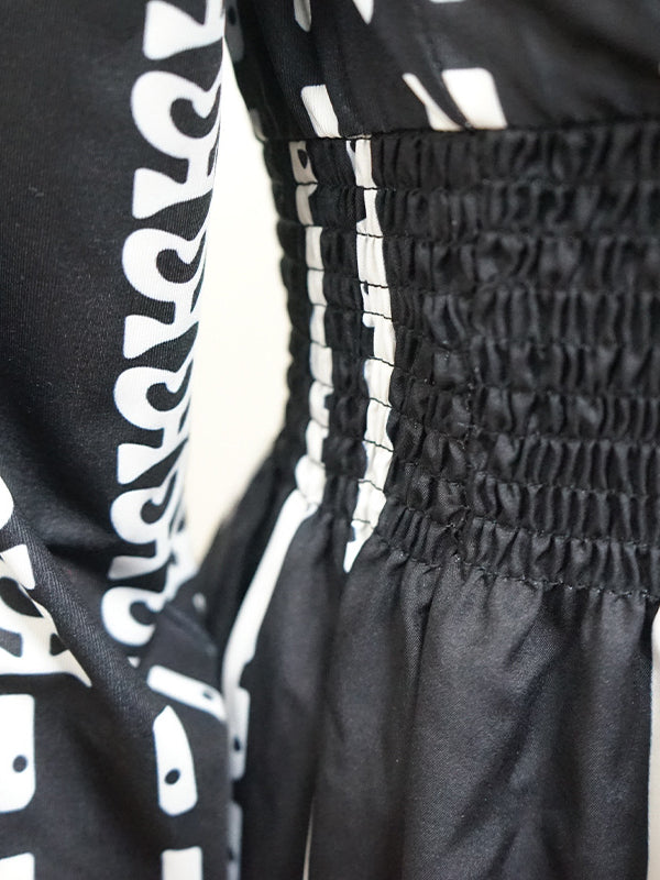 Elegant Waist Trimming Striped Dress featuring a black and white patterned shirred bodice, perfect for langry fashion and ملابس