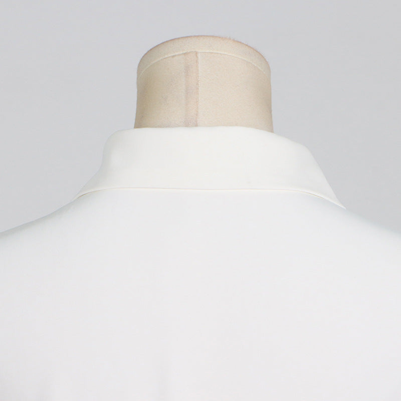White collared shirt on mannequin showcasing elegant fashion, ملابس, and luxury style