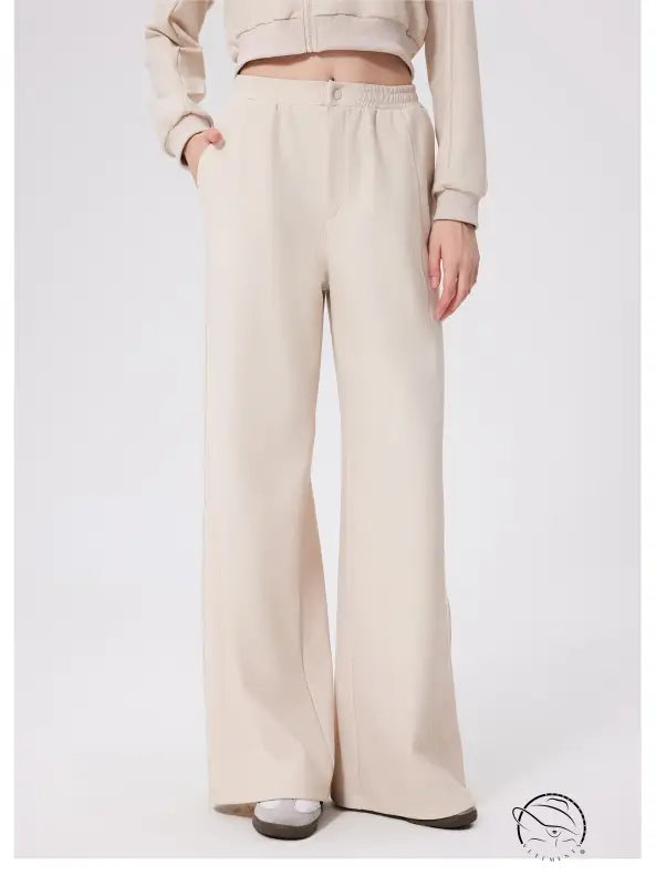 Cream-colored loose fitness warm pants with high waist and elastic band