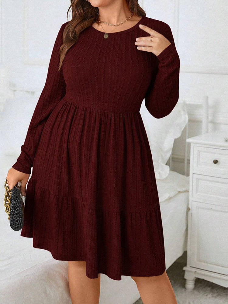 Plus-size women’s long-sleeve tiered smock dress in elegant red midi style