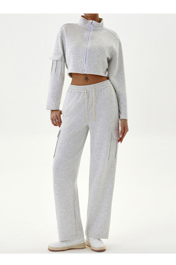 Woman wearing gray cropped jacket and cargo pants in casual Sports Sets, stylish langry fashion