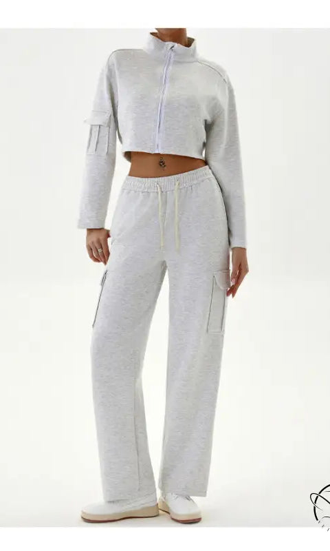 Woman in gray cropped jacket and cargo pants, winter workwear casual sports set