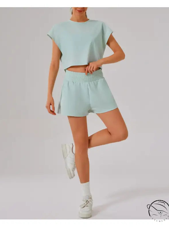 Mint green loose sports yoga fitness set with white sneakers