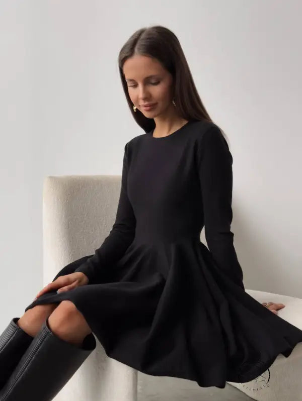 Beautiful woolen knitted black long-sleeved dress