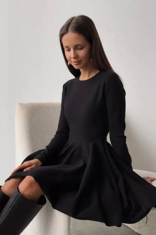 Beautiful woolen knitted black long-sleeved dress