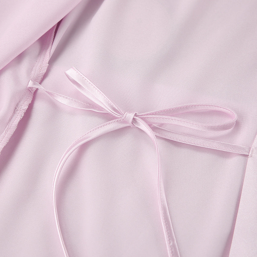 Light pink satin ribbon tied in a bow for Pink Cardigan Feather Homewear lounge attire