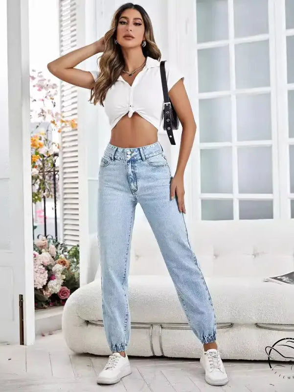 Light wash blue drooping loose denim pants with high waist and cuffs