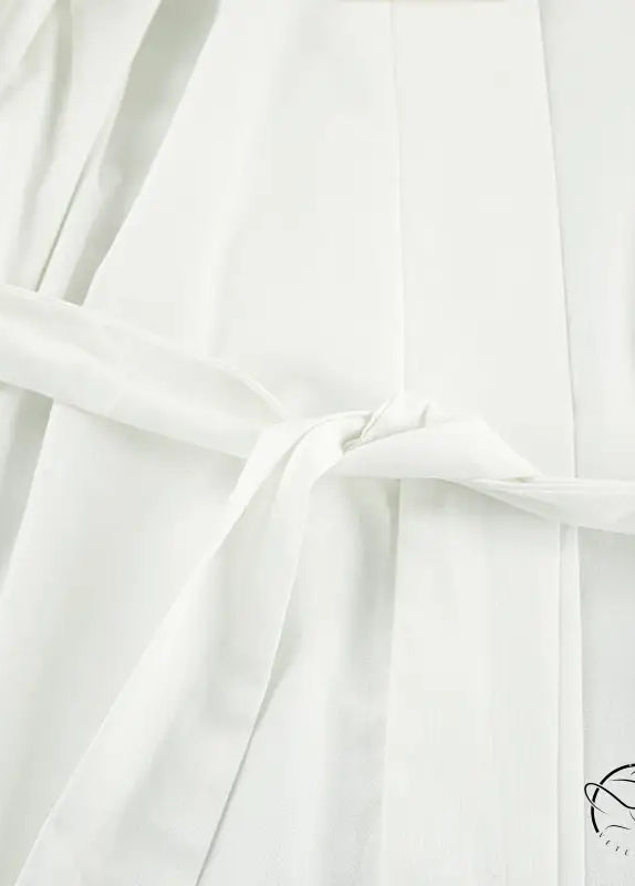 White soft-textured cotton langry robe with tied waistband, lace up fashion nightgown