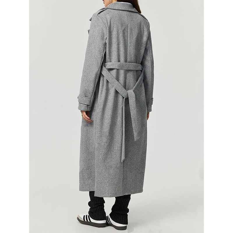 Long gray wool trench coat with double-breasted buttons and belt, cozy fashion outerwear