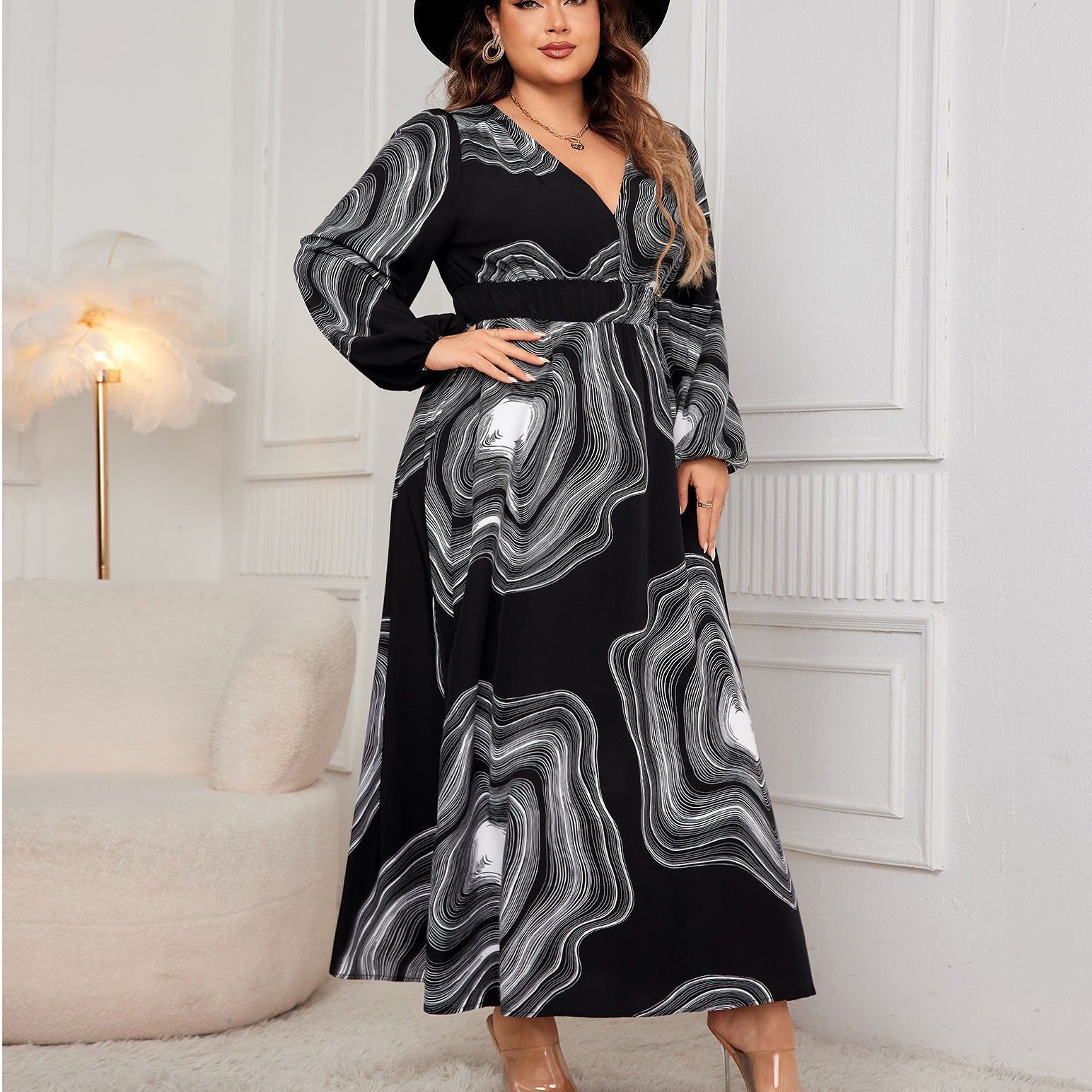 Elegant black and white patterned maxi dress showcasing stylish langry fashion and ملابس