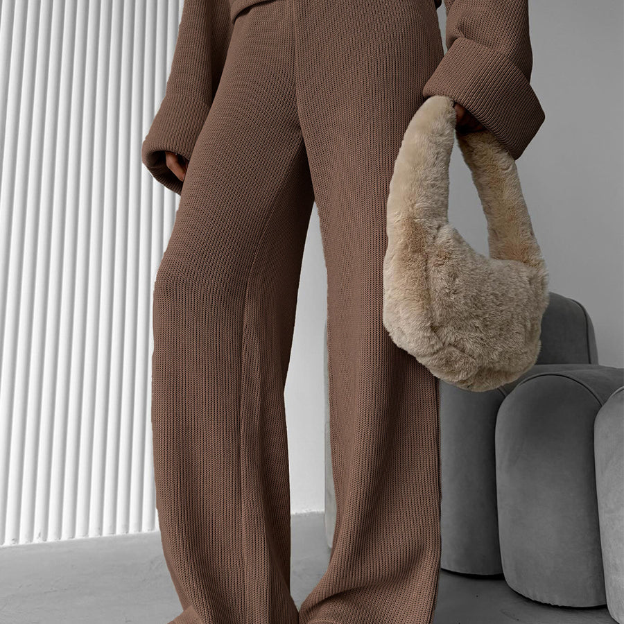 Brown textured sweater with fluffy handbag in enchanting langry fashion ملابس