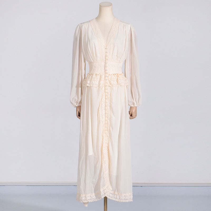 Elegant long cream-colored dress with lace trim from French Stitching fashion collection