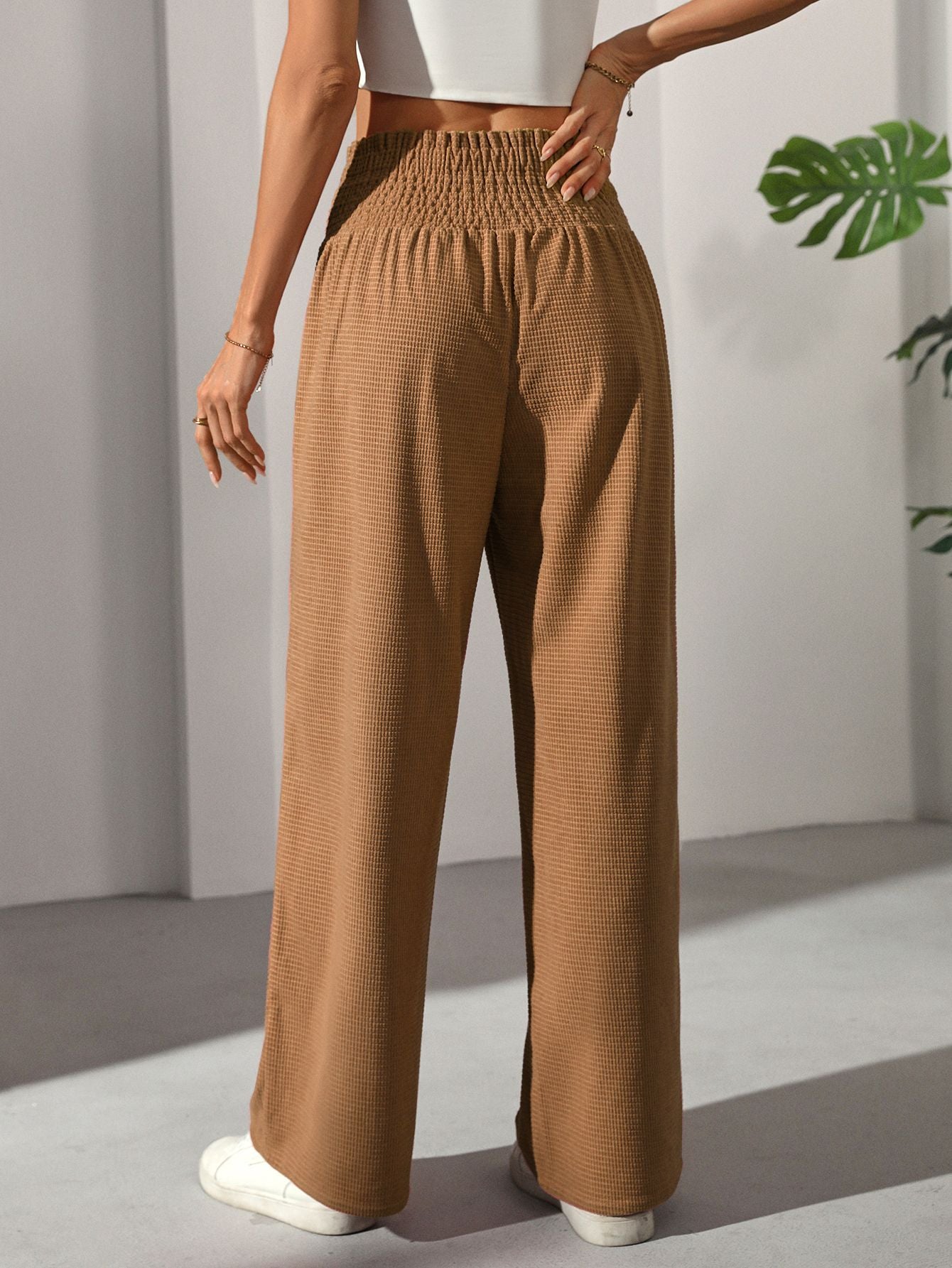Women’s casual elegant French trousers with wide-leg design and shirred high waist