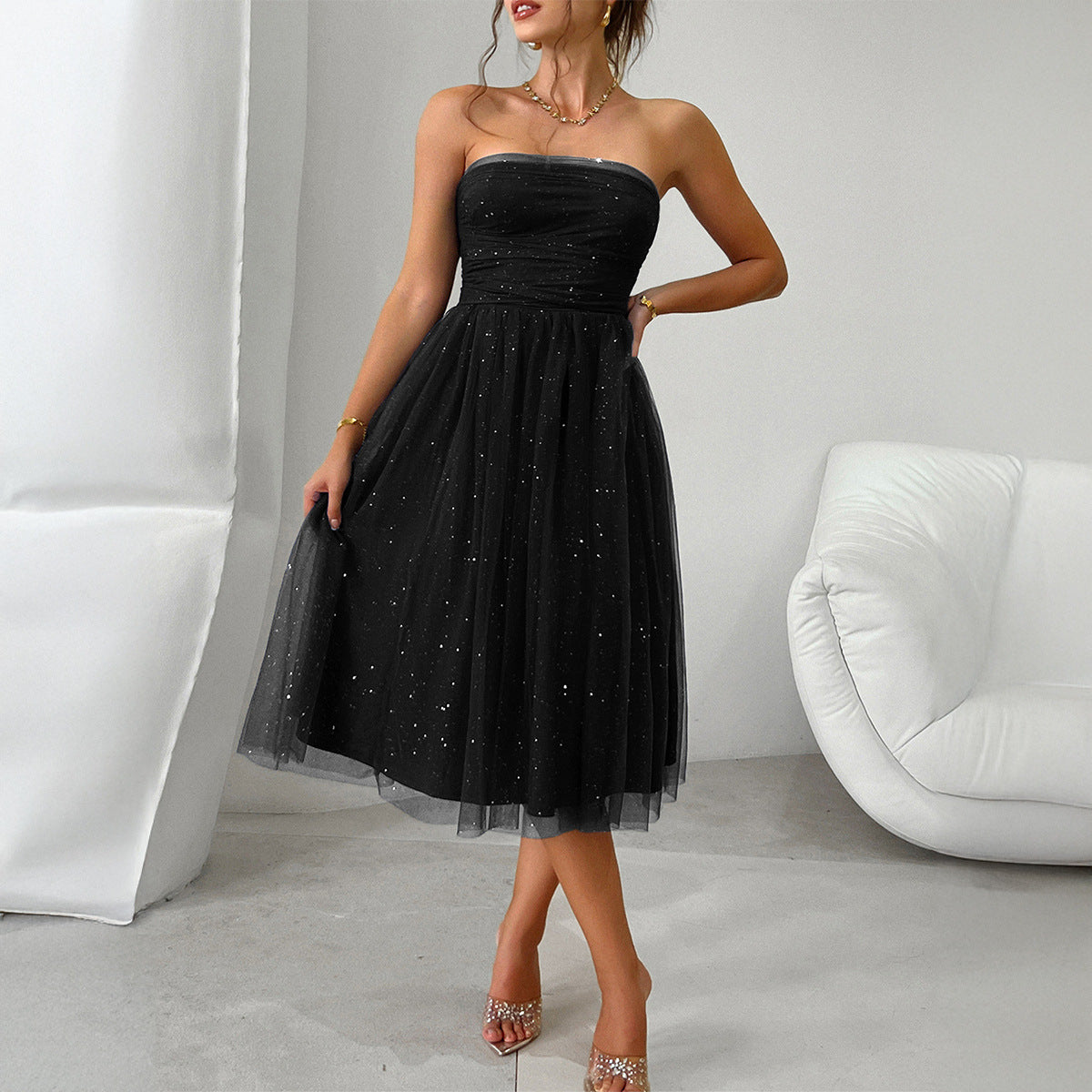 Strapless black tulle cocktail dress with sparkly details for elegant fashion