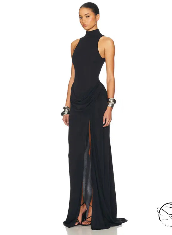 Black high-neck sleeveless gown with tight waist, high split, and draped detail