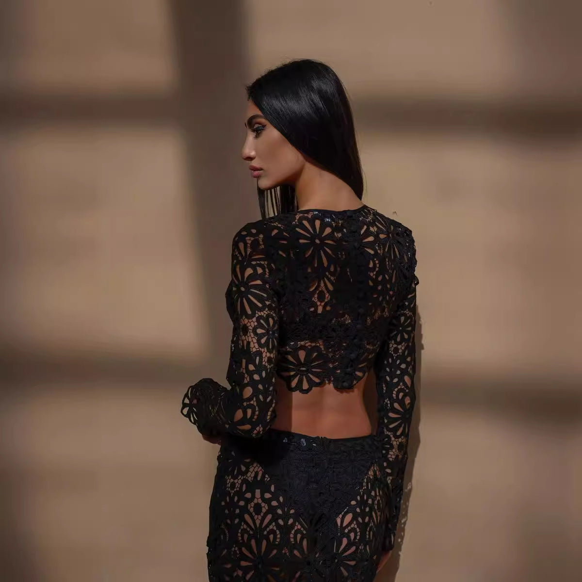 Slim fit hollow lace tops skirt two-piece set featuring long-sleeved crop top and skirt